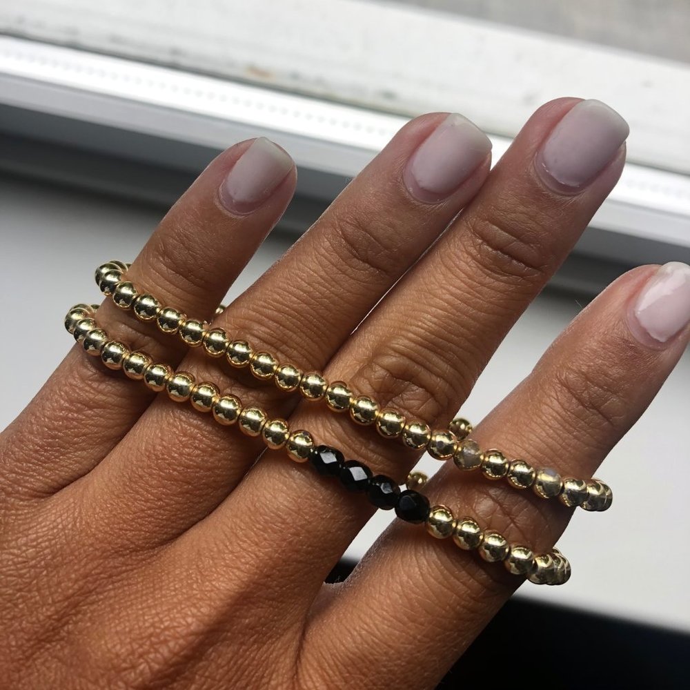 Gold Beaded Bracelets wit Black Accent